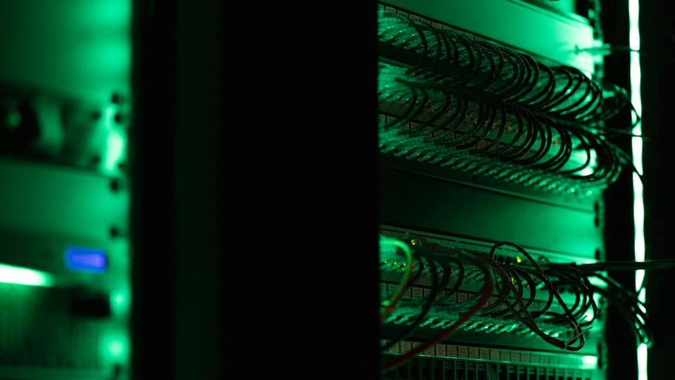 Racks of network equipment in a server room
